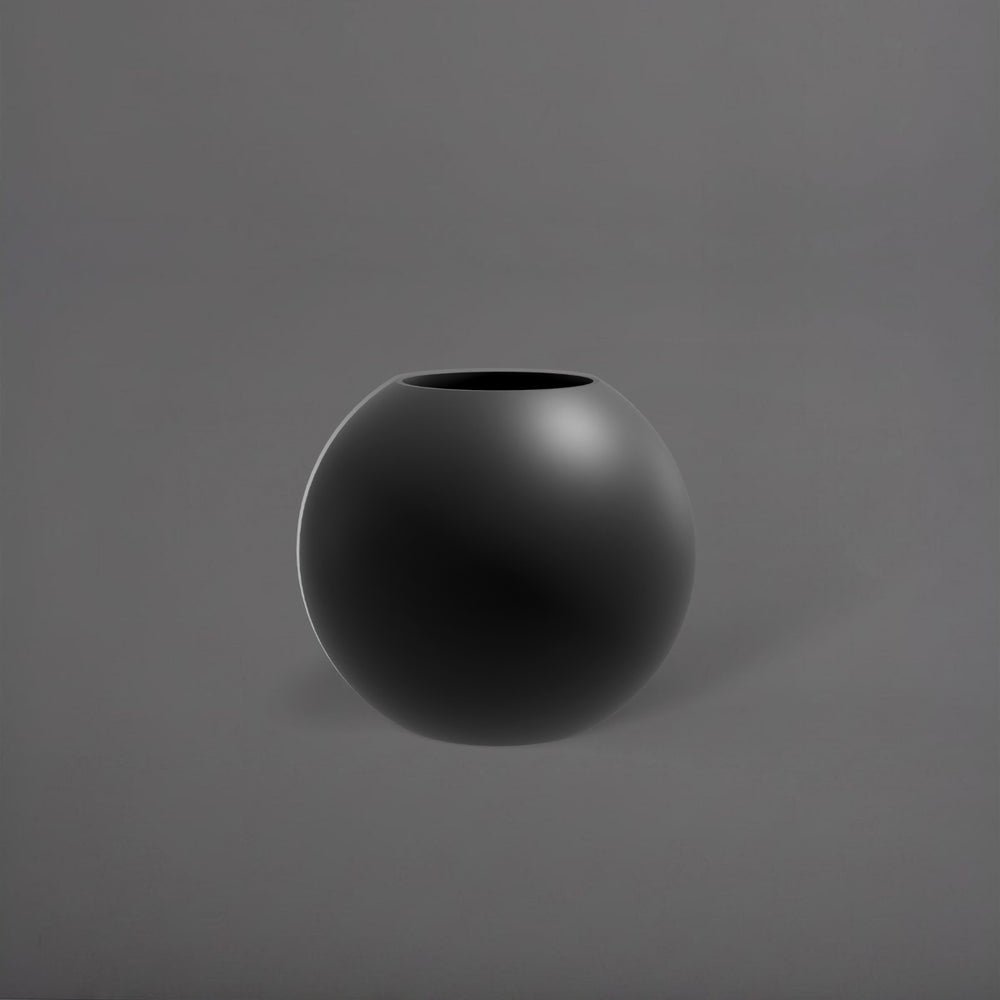Globe Fiberglass Planter in matte charcoal against gray background.