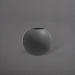 Globe Fiberglass Planter in matte gunmetal against gray background.