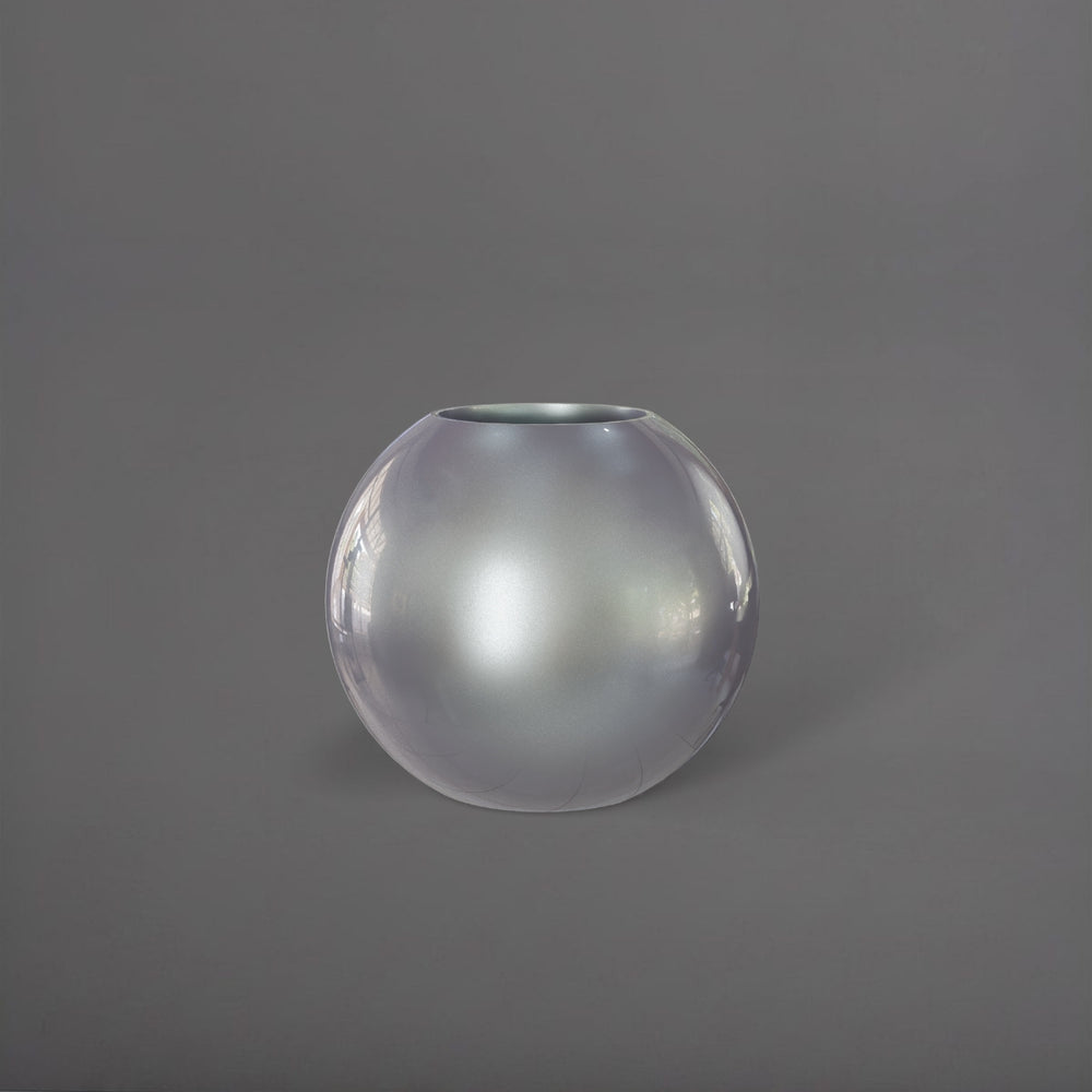 Globe Fiberglass Planter in metallic silver against gray background.