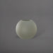 Globe Fiberglass Planter in satin beige against gray background.
