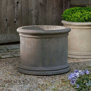 Gramercy Planter on gravel in the backyard