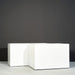 Granada Wide Rectangle Fiberglass Planter on concrete shown with different sizes.