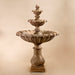 Grand Chateau Three Tier Fountain against brown background.