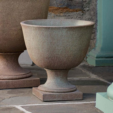 Hampstead Urn Planter, Large on concrete in the porch