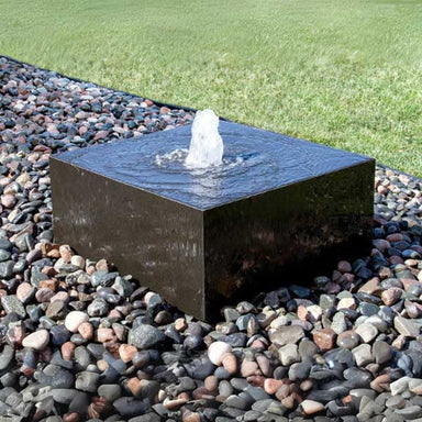 Heiho Fountain Kit 24 x 24 18H on gravel in the backyard