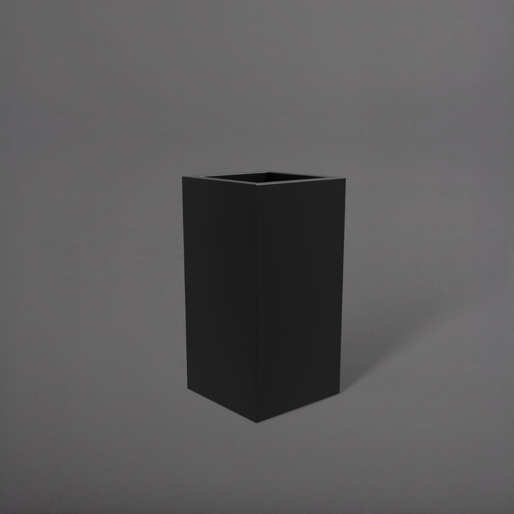 Hollywood Corner Fiberglass Planter in matte black against gray background.