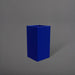 Hollywood Corner Fiberglass Planter in matte cobalt blue against gray background.