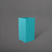 Hollywood Corner Fiberglass Planter in satin seafoam green against gray background.