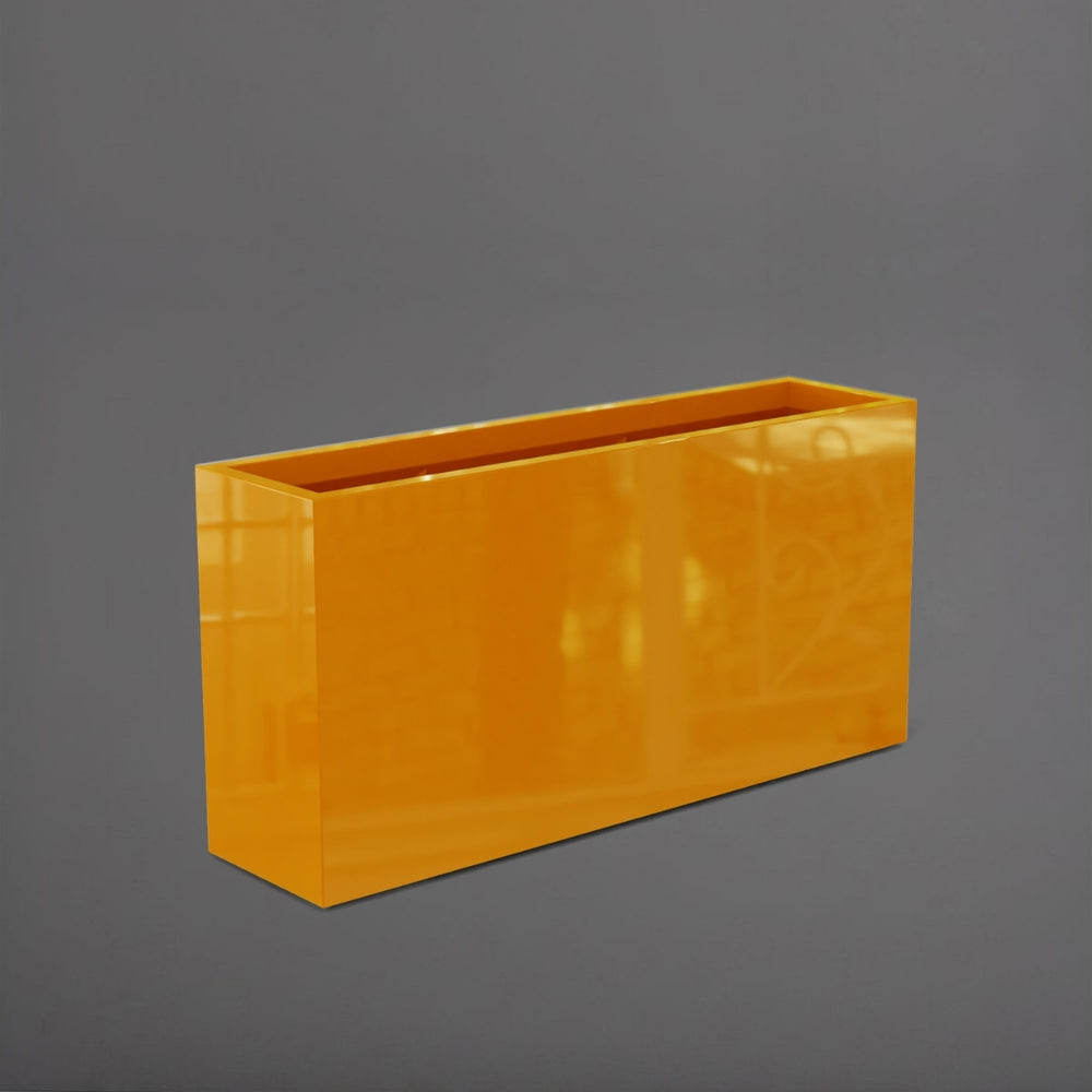 Hollywood Rectangle Fiberglass Planter in gloss tangerine against gray background.