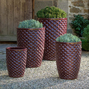 Honeycomb Planter, Tall - Plum - S/4 on gravel filled with plants