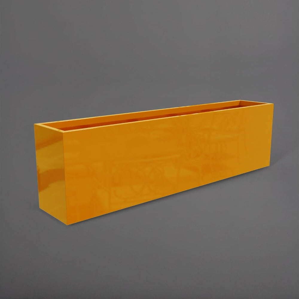 Hudson Extra Long Rectangle Fiberglass Planter in gloss tangerine against gray background.