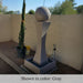 I Fountain with ball in gray color in action.