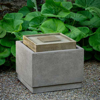 Infinity Fountain on the ground with plants background