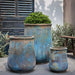 Jerez Planter - Blue Verdigris - S/3 on concrete filled with plants