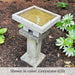 Kosei Birdbath filled with water in the backyard