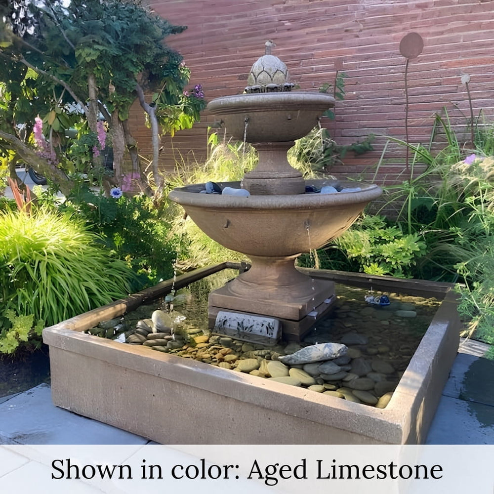 La Mirande Fountain n action in the lush garden oasis.