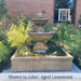La Mirande Fountain running on patio in the garden oasis.