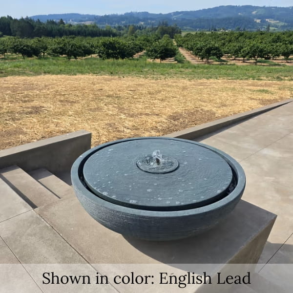 Large Girona Fountain in english lead angled patio view.