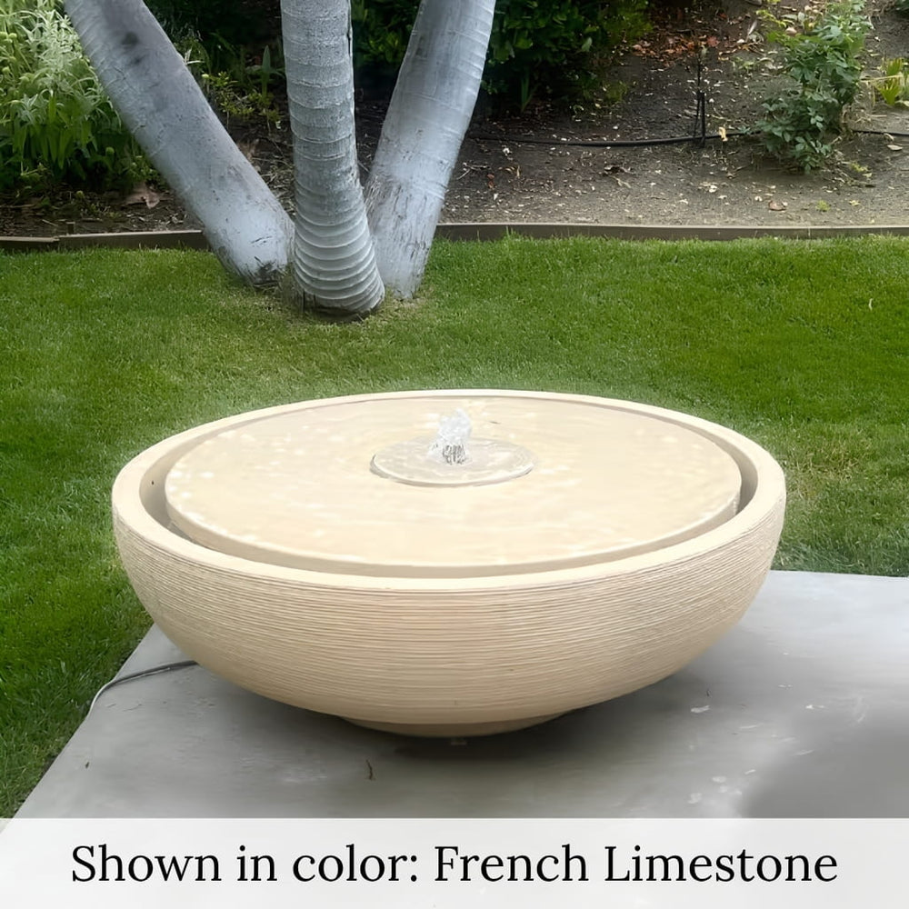 Large Girona Fountain in French LImestone in the backyard upclose.