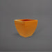 Lima Square Tapered Fiberglass Planter in gloss tangerine against gray background.