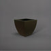 Lima Square Tapered Fiberglass Planter in matte bronze against gray background.