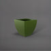 Lima Square Tapered Fiberglass Planter in satin green against gray background.