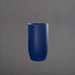 Lisbon Tall Round Tapered Fiberglass Planter in matte cobalt blue against gray background.