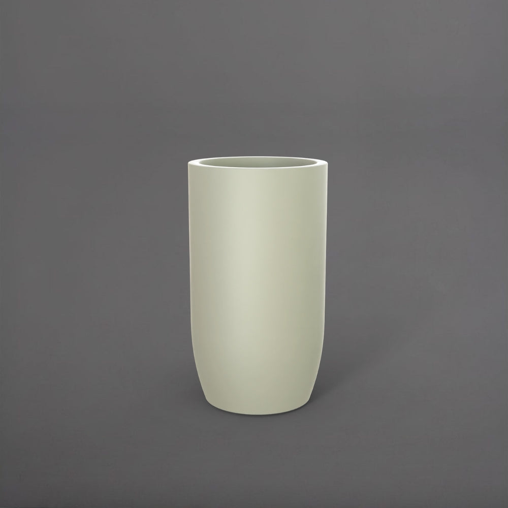 Lisbon Tall Round Tapered Fiberglass Planter in satin beige against gray background.