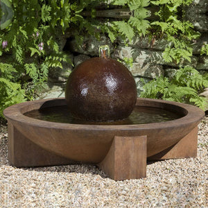 Low Zen Sphere bubbler water feature in action sitting on crushed gravel