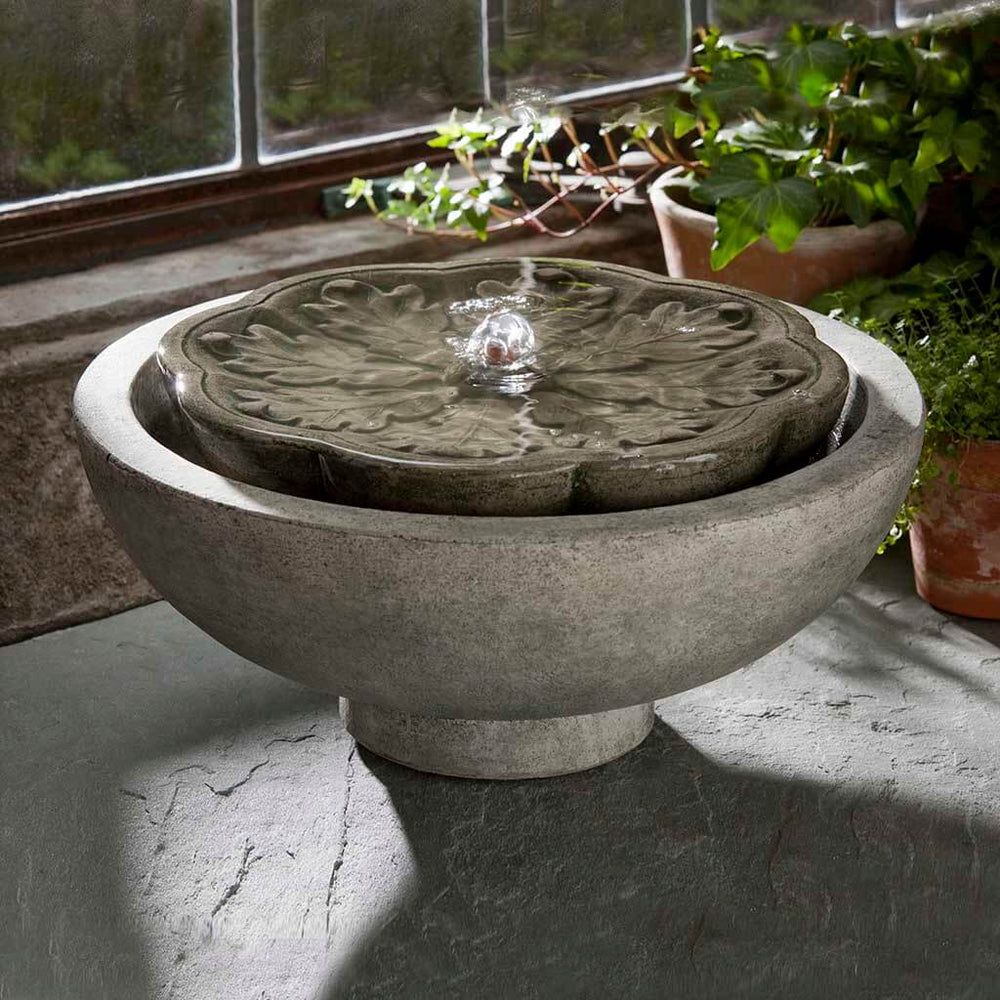 M-Series Flores fountain on concrete in the backyard