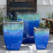 Macouba Planter - Running Aqua - S/3 on concrete in the backyard