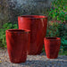 Marta Planter - Tropic Red - S/3 on gravel in the backyard