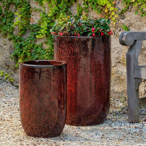 Merlot Planter on gravel filled with plants