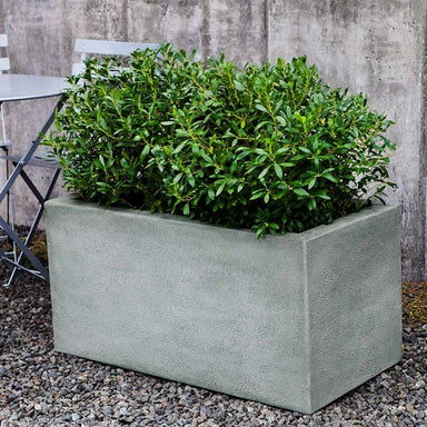 Metropolis Rectangle 361818 Planter gravel filled with plants