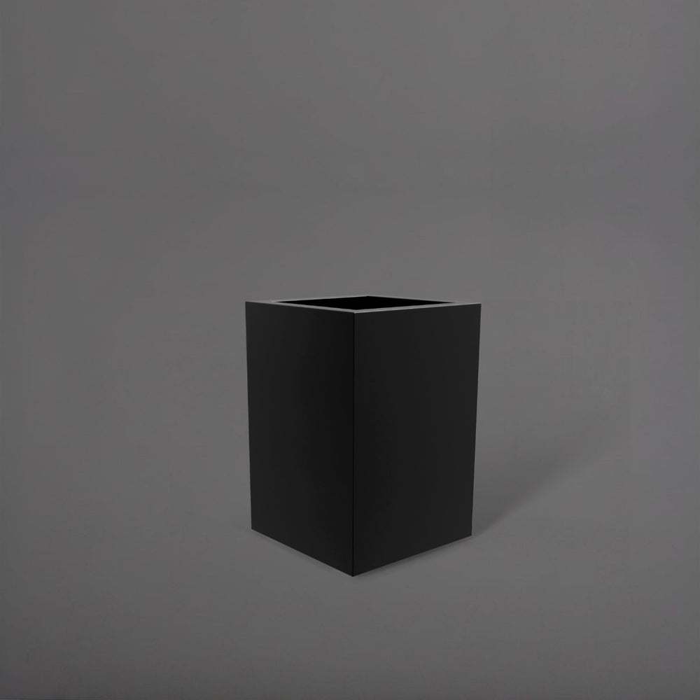 Miami Short Corner Fiberglass Planter in matte black against gray background.