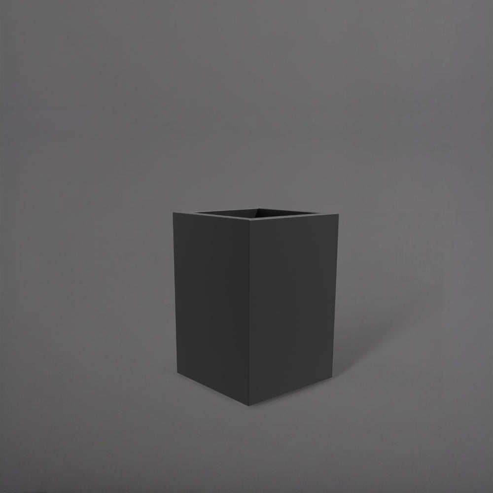 Miami Short Corner Fiberglass Planter in matte charcoal against gray background.