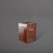 Miami Short Corner Fiberglass Planter in metallic bronze against gray background.