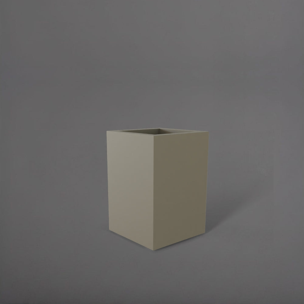 Miami Short Corner Fiberglass Planter in satin beige against gray background.
