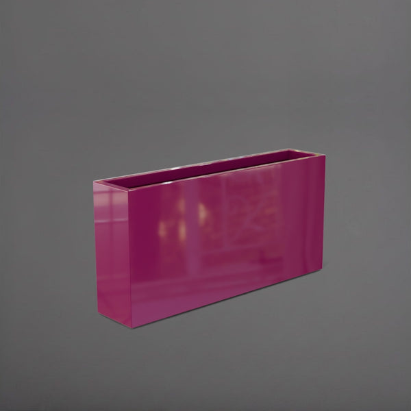 Milano Narrow Rectangle Planter in gloss eggplant against gray background.