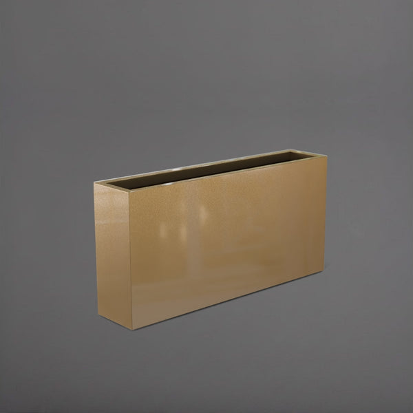 Milano Narrow Rectangle Planter in gloss metallic gold against gray background. 