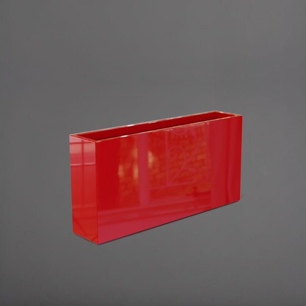 Milano Narrow Rectangle Planter in gloss red against gray background.