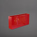 Milano Narrow Rectangle Planter in gloss red against gray background.