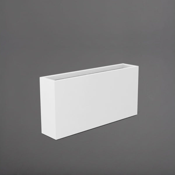 Milano Narrow Rectangle Planter in matte bright white against gray background. 