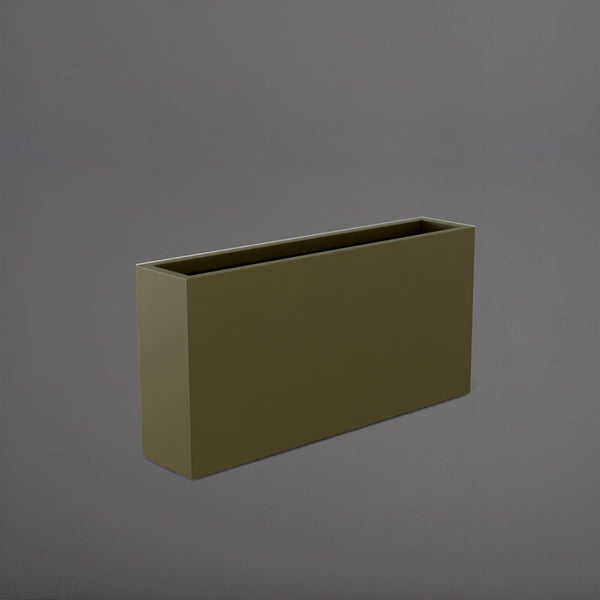 Milano Narrow Rectangle Planter in matte bronze against gray background.