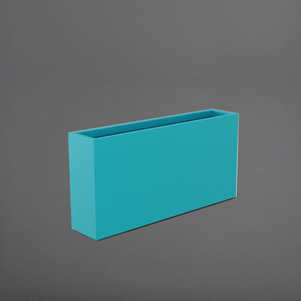 Milano Narrow Rectangle Planter in satin sea foam against gray background.