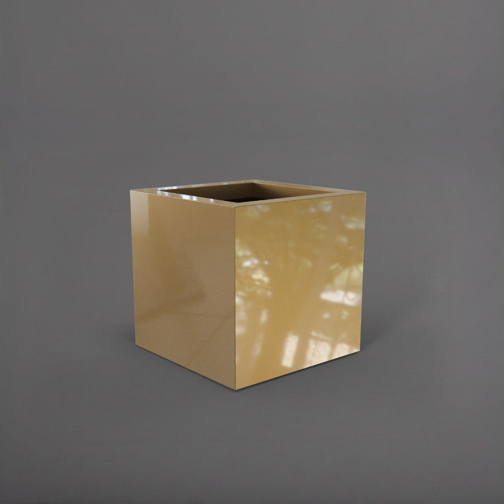 Montroy Cube Fiberglass Planter in gloss metallic gold against gray background.