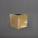 Montroy Cube Fiberglass Planter in gloss metallic gold against gray background.