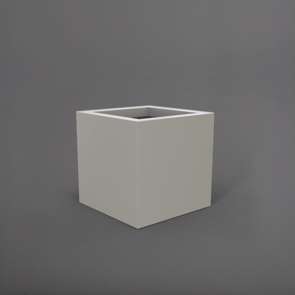 Montroy Cube Fiberglass Planter in matte cement grey against gray background.