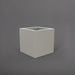 Montroy Cube Fiberglass Planter in matte cement grey against gray background.