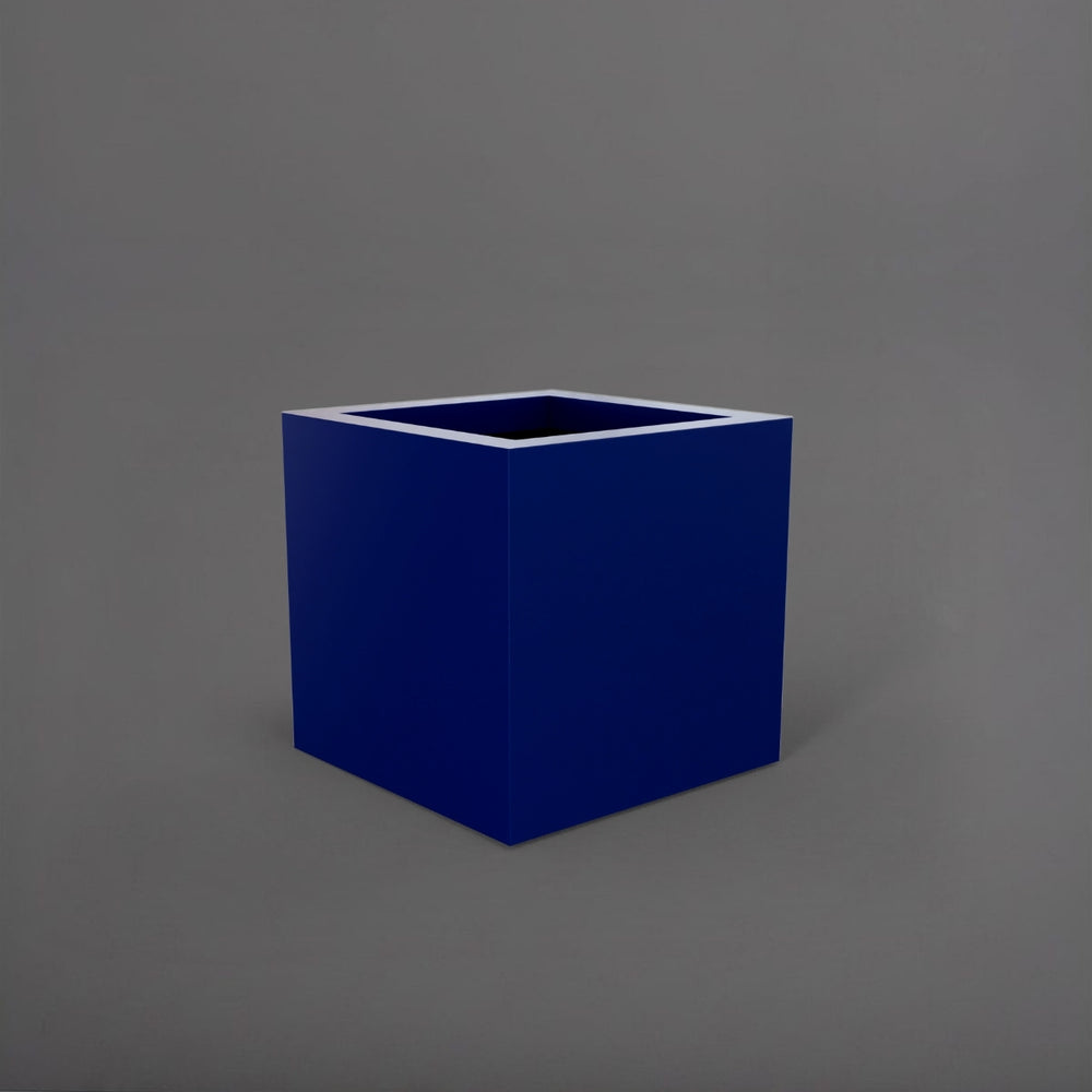 Montroy Cube Fiberglass Planter in matte cobalt blue against gray background.